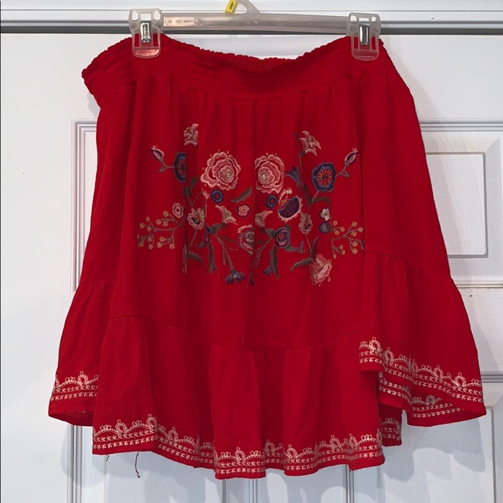 Off the shoulder floral shirt.